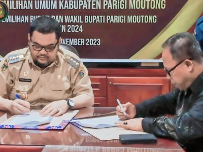 Pj Bupati Richard Tandatangani NPHD Dengan KPU Parigi Moutong
